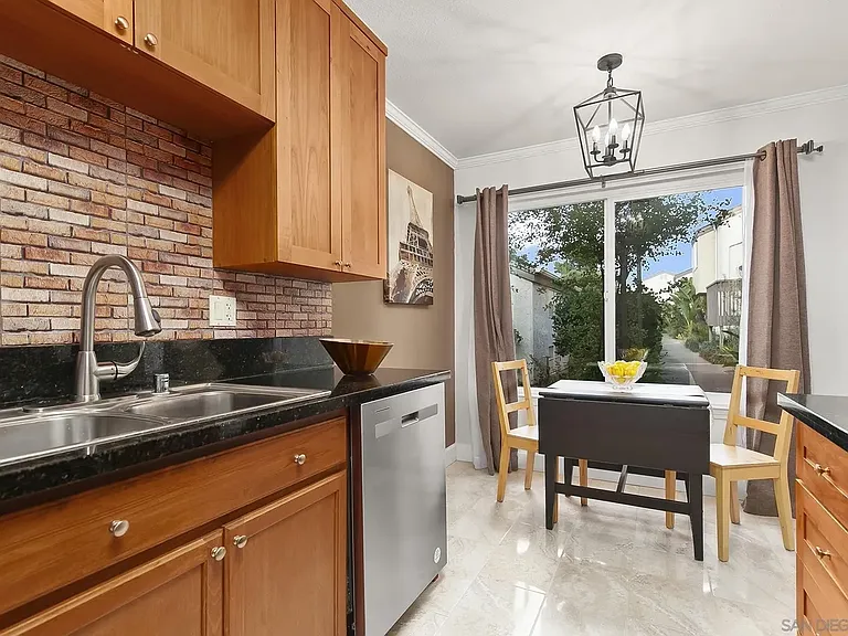 From kitchen to dining area and exterior.