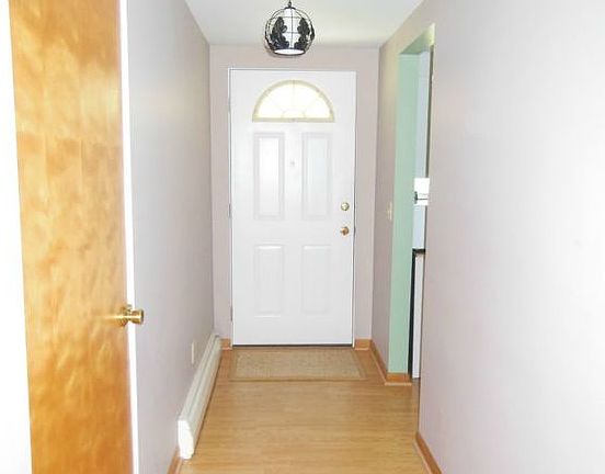 The front entry has newer laminate floors.
