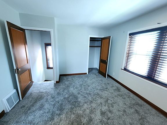 Front Room looking at entrance and closet