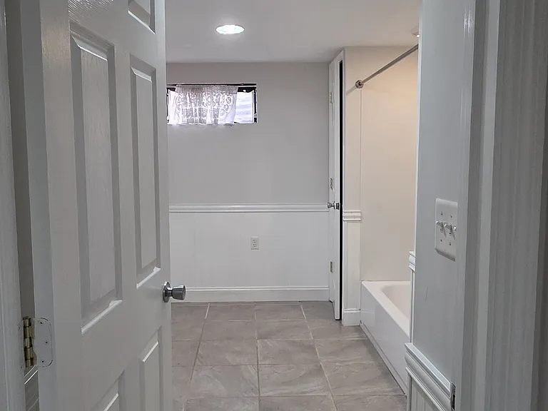 Full bath and laundry in Basement
