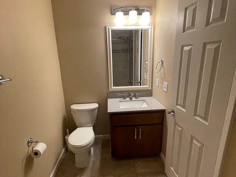 Main Bathroom. Putting in new solid surface counter top and faucet