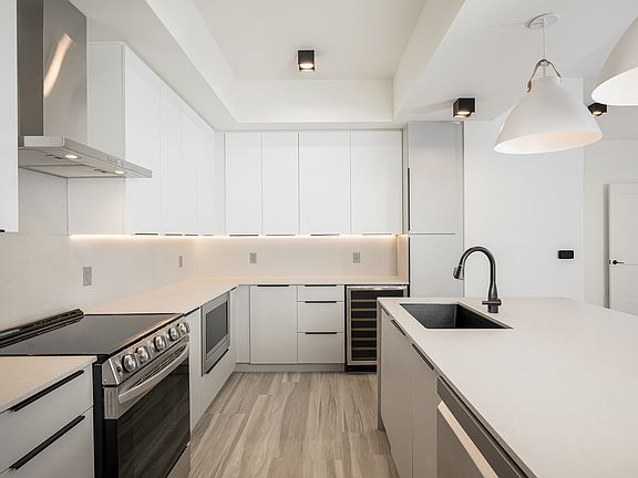 Electric cooktop stoves and ovens with ranges
