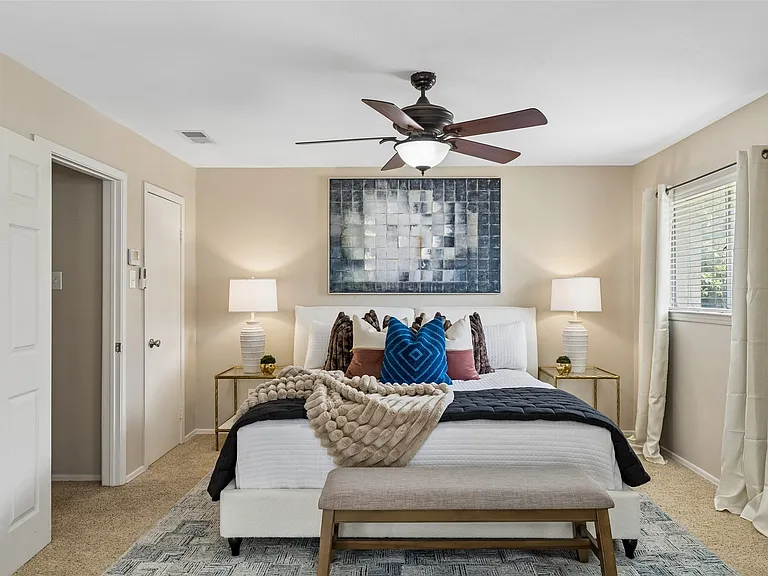 The primary bedroom has plenty of room for a king-sized bed and nightstands.