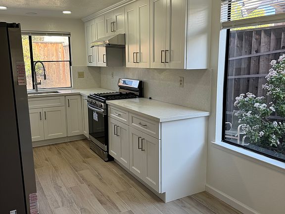 Kitchen View with Range/Oven/Hood installed in Jan 2026