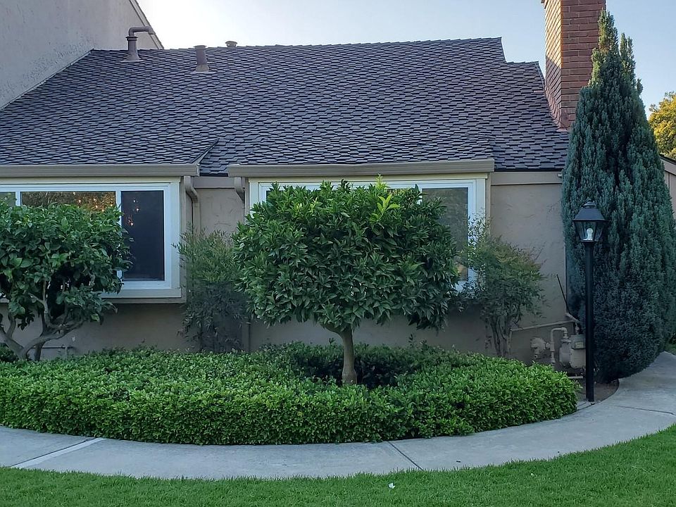 Front of townhouse. Private corner end unit.