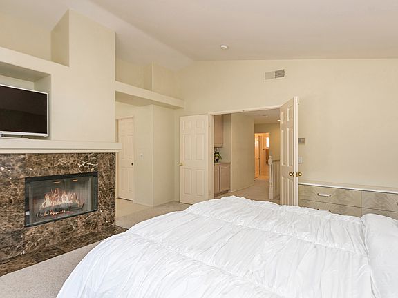 Master w/wood fireplace.