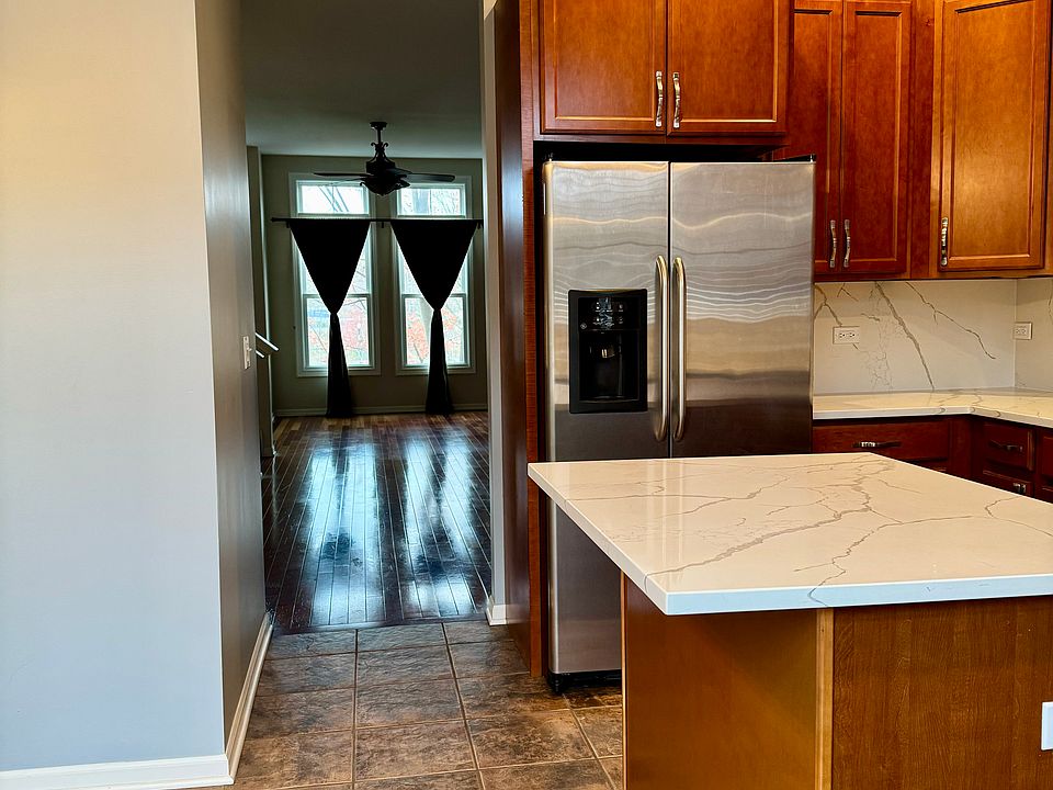 Kitchen leading into dining/living room