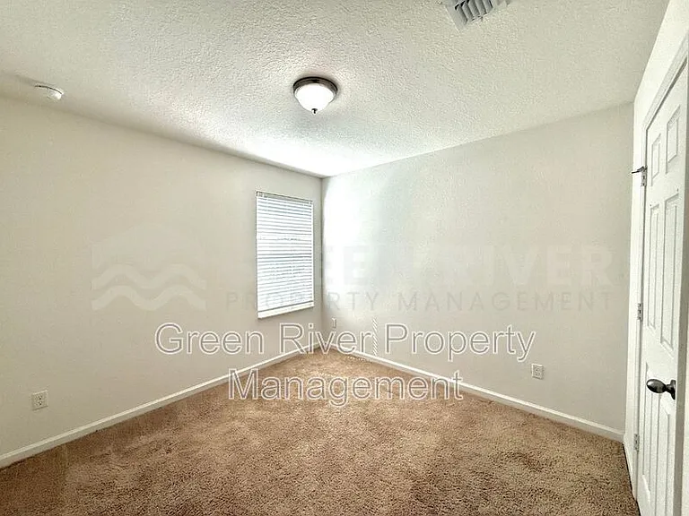 8704 Lake George Cir W — Photo 25