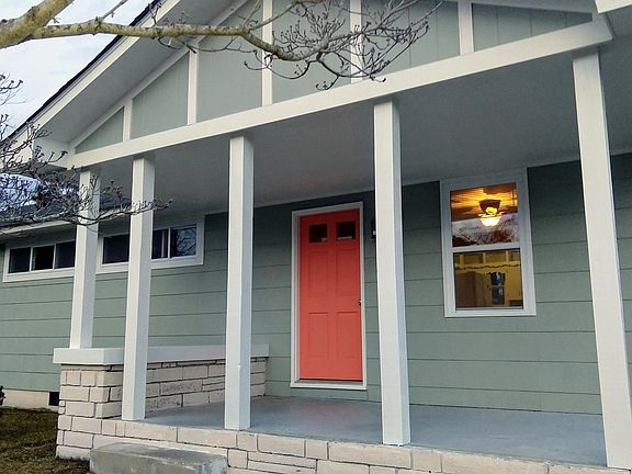 Covered Front Porch with full fenced in yard. Park across street.
