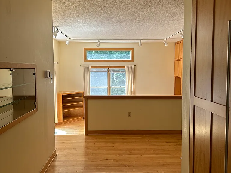 From the front entry past the dining room to the sunken living room