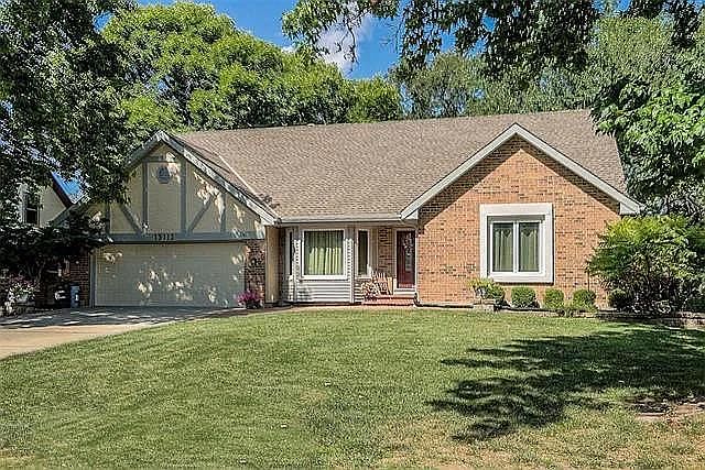 Great curb appeal with view of Walden Pond.