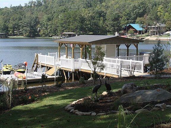 Large dock with covered boat