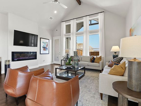 Living room in the Greenbrier home plan by Trophy Signature Homes - REPRESENTATIVE PHOTO