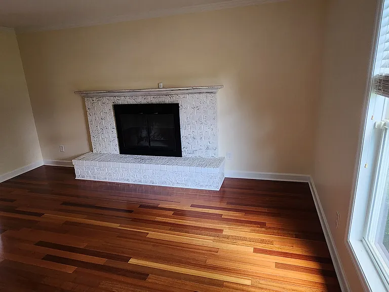 Living room with fireplace, from front entrance