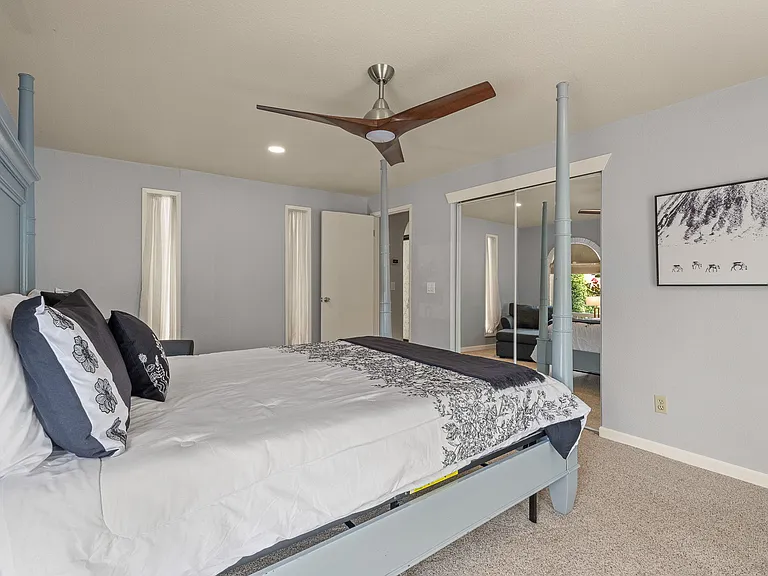 Primary with queen bed, walk in closet and private bath