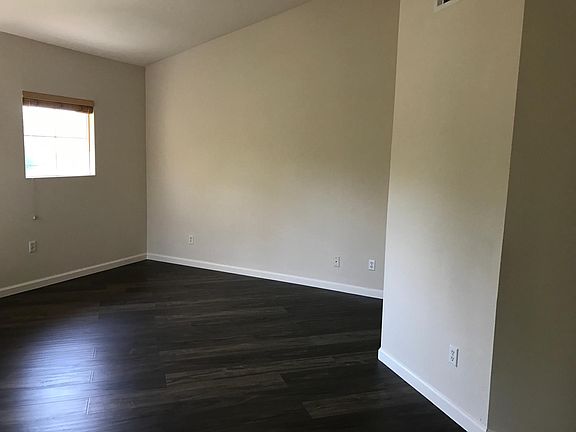 Master Bedrooom with high vaulted ceiling.