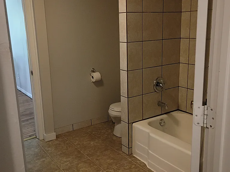 Bathroom facing Tub & Toilet & LR_06222026