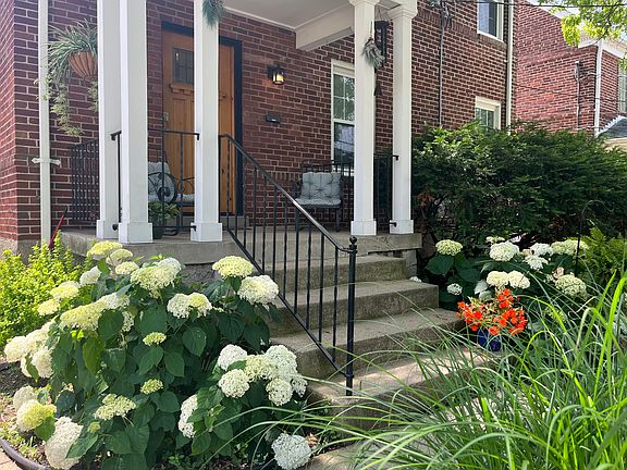 Front porch in Spring when hydrangeas are in bloom.