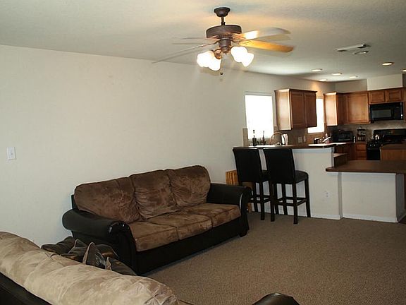 Breakfast bar & opens to family room.