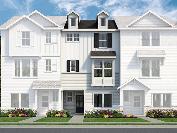 The Dunn- Farmhouse Elevation with Rear Load Garage