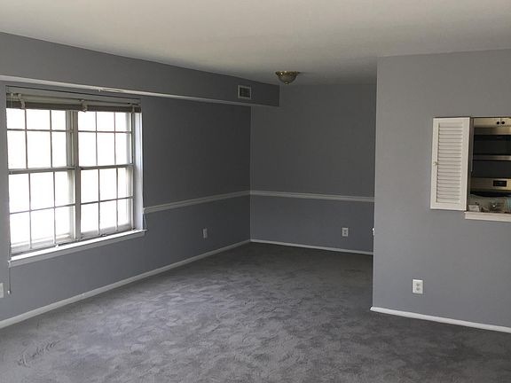 Livingroom to dining room view (new carpet and padding).