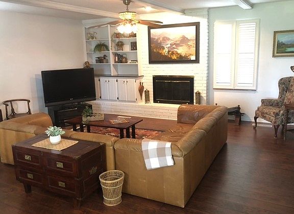 Main living room. One step down. Fireplace is not opertational