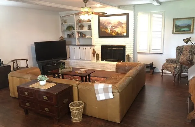 Main living room. One step down. Fireplace is not opertational
