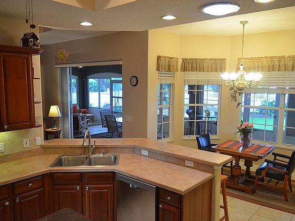 kitchen overlooks sunroom