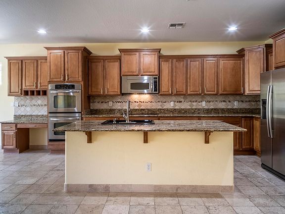 4th image of 9044 W Quail Track Dr