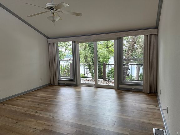 Primary bedroom looking ttoward the lake
