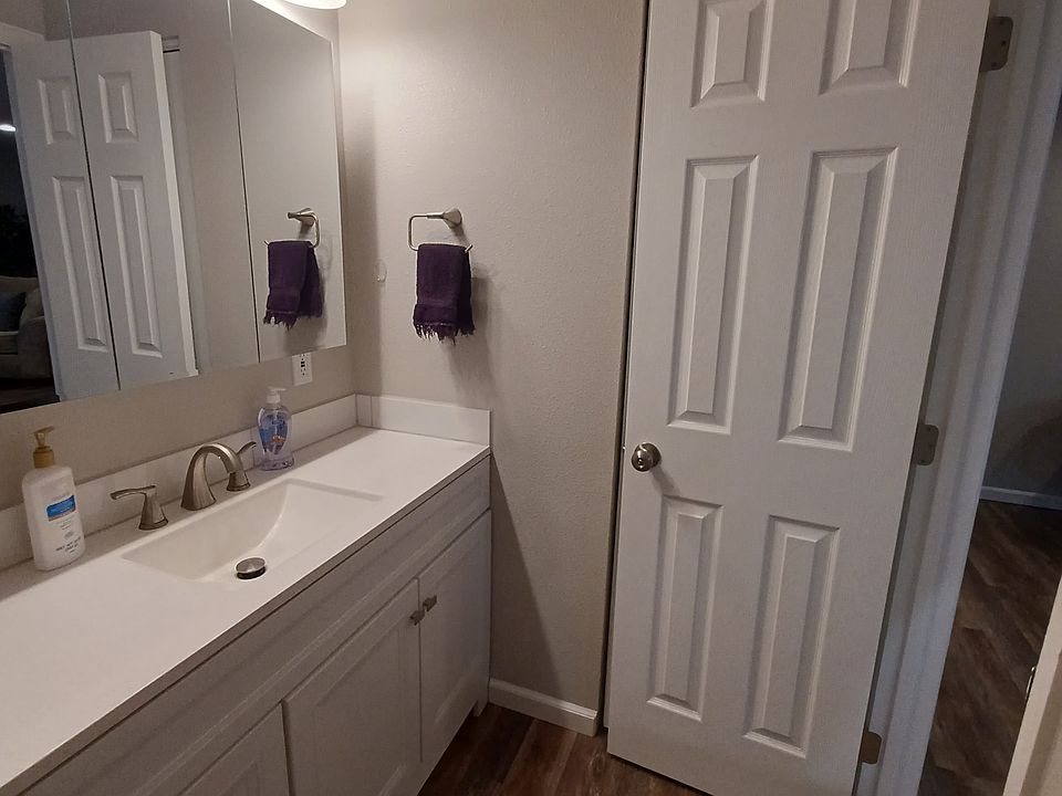 Full size bathroom with linen closet