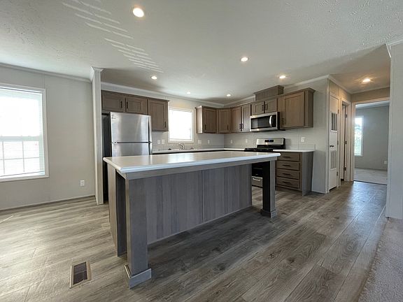 2nd image of 7204 E Grand River Ave #493