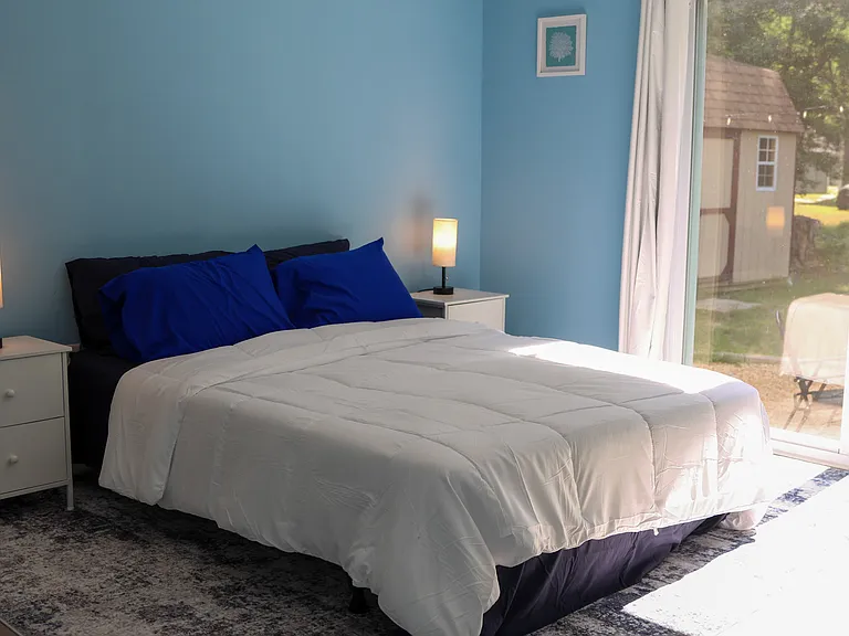 Bedroom 3, 1st floor primary with private on suite bath. Queen size bed and Roku TV
