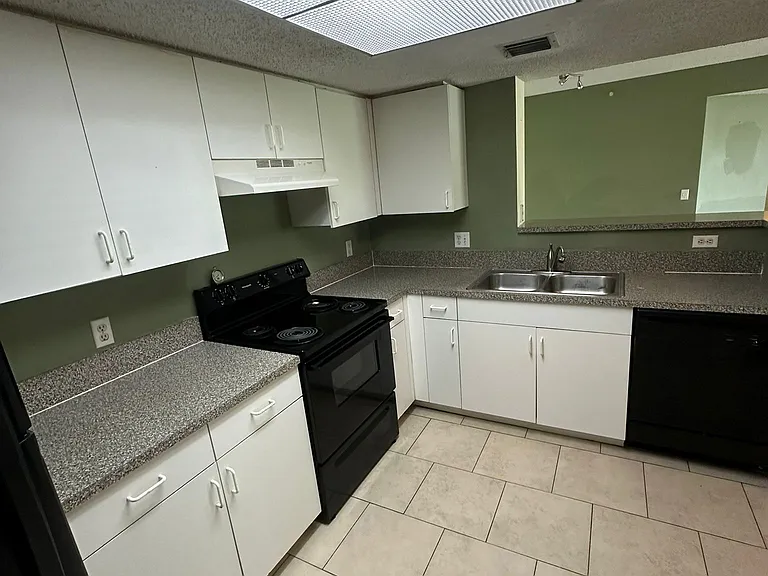 5005 Wiles Rd — Photo 16