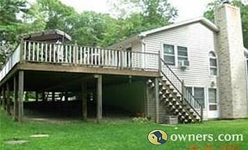 Deck and side of house with separate entrance to the apartment