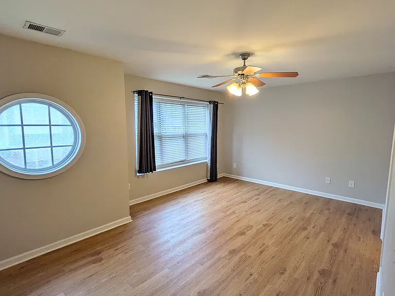Bedroom 1: Oversized bedroom with room for King Bed and Desk area