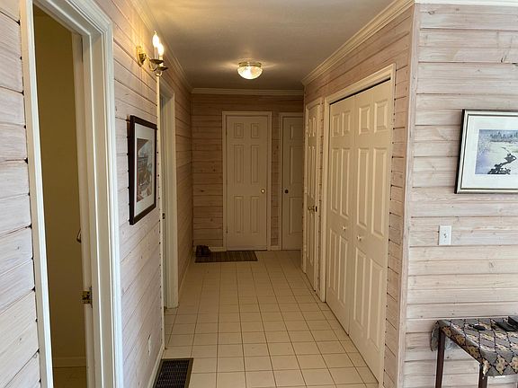 hallway, clothes closet and laundry closet
