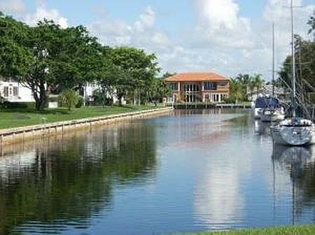 FRONT OF ENTRANCE OF COMPLEX LOOKING NORTH