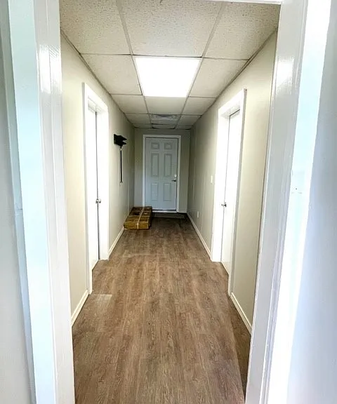 Central hallway with secured private entrances for each unit