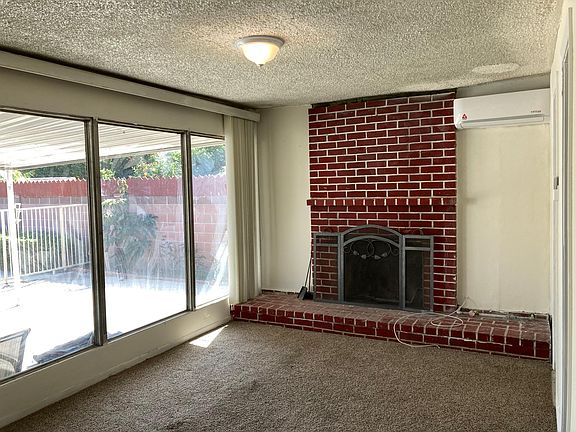 Master bedroom opens up to sunny backyard