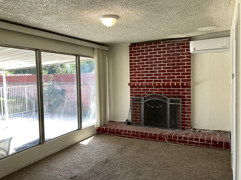 Master bedroom opens up to sunny backyard