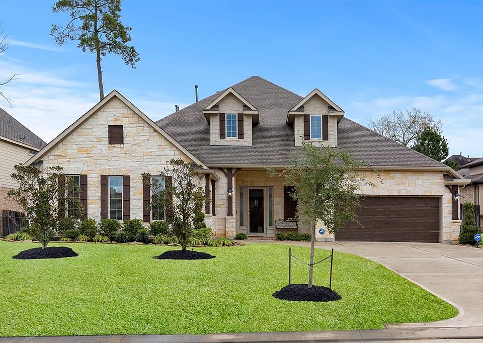 Beautiful stone elevation on this Village Builders single story home!