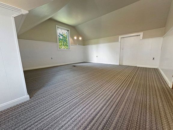 Very large, new carpet, and new paint