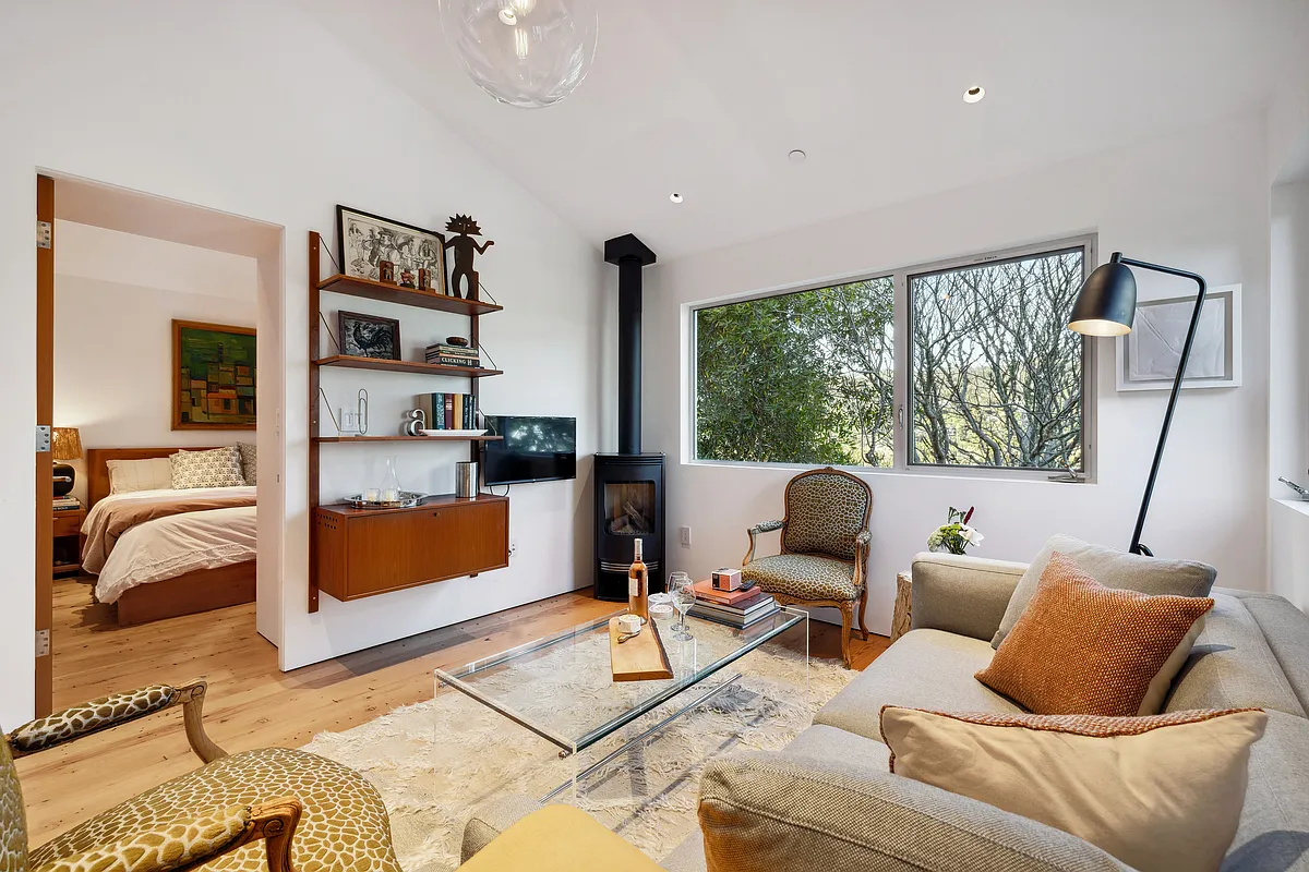 Public space with upstairs queen bedroom. - Ethel Ave
