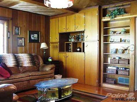 Built in wet bar and has a fireplace.