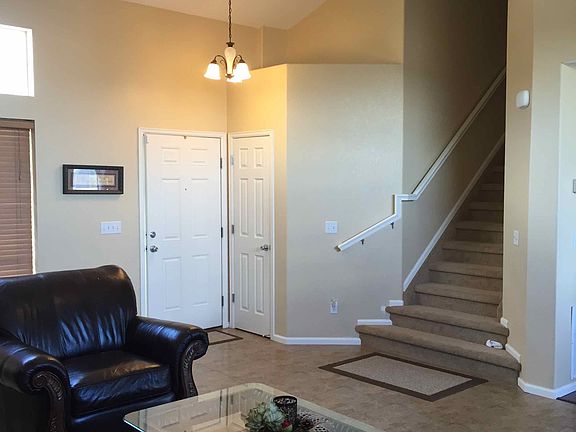 Living - w/stairs & front dr