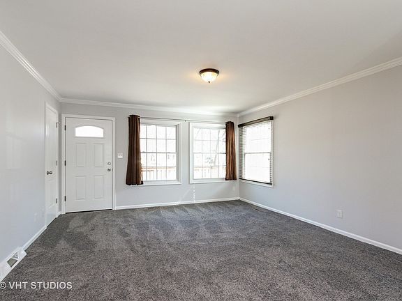 Living Room was recently painted and new carpet.