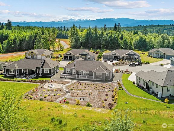 Lots of space for gardening and entertaining in this upgraded back yard.>