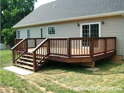The Grand Deck (South Side)
						:
						The lawn was stressed after the construction of the deck, it is green now.