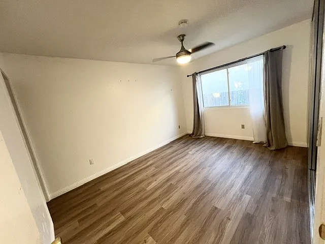 Master bedroom - (repainted and replaced brown carpet with new flooring